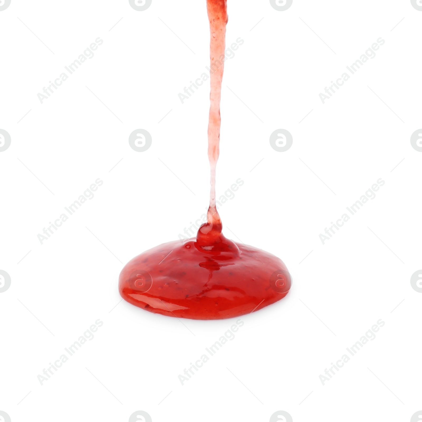 Photo of Pouring delicious strawberry sauce on white background, closeup