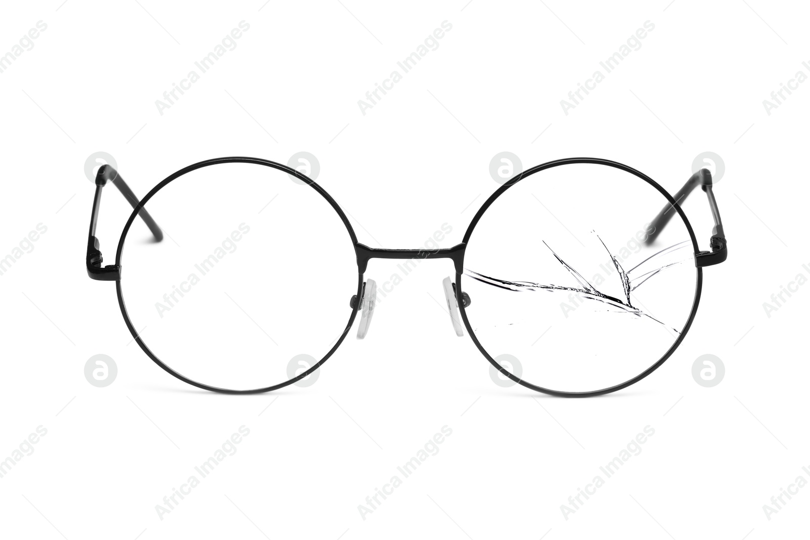 Image of Eyeglasses with one broken lens isolated on white