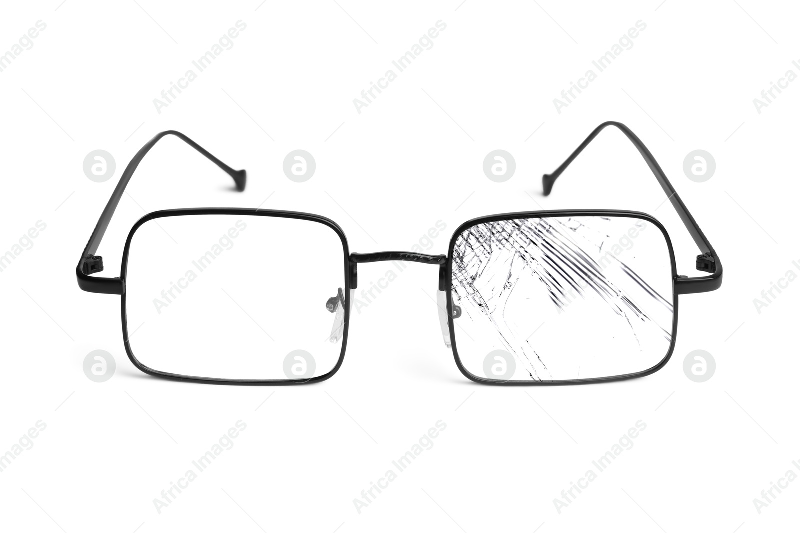 Image of Eyeglasses with one broken lens isolated on white