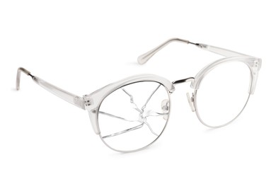 Image of Eyeglasses with one broken lens isolated on white