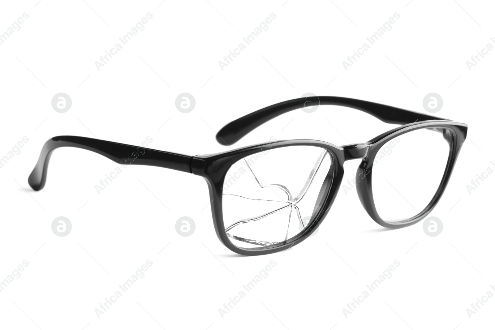 Image of Eyeglasses with one broken lens isolated on white