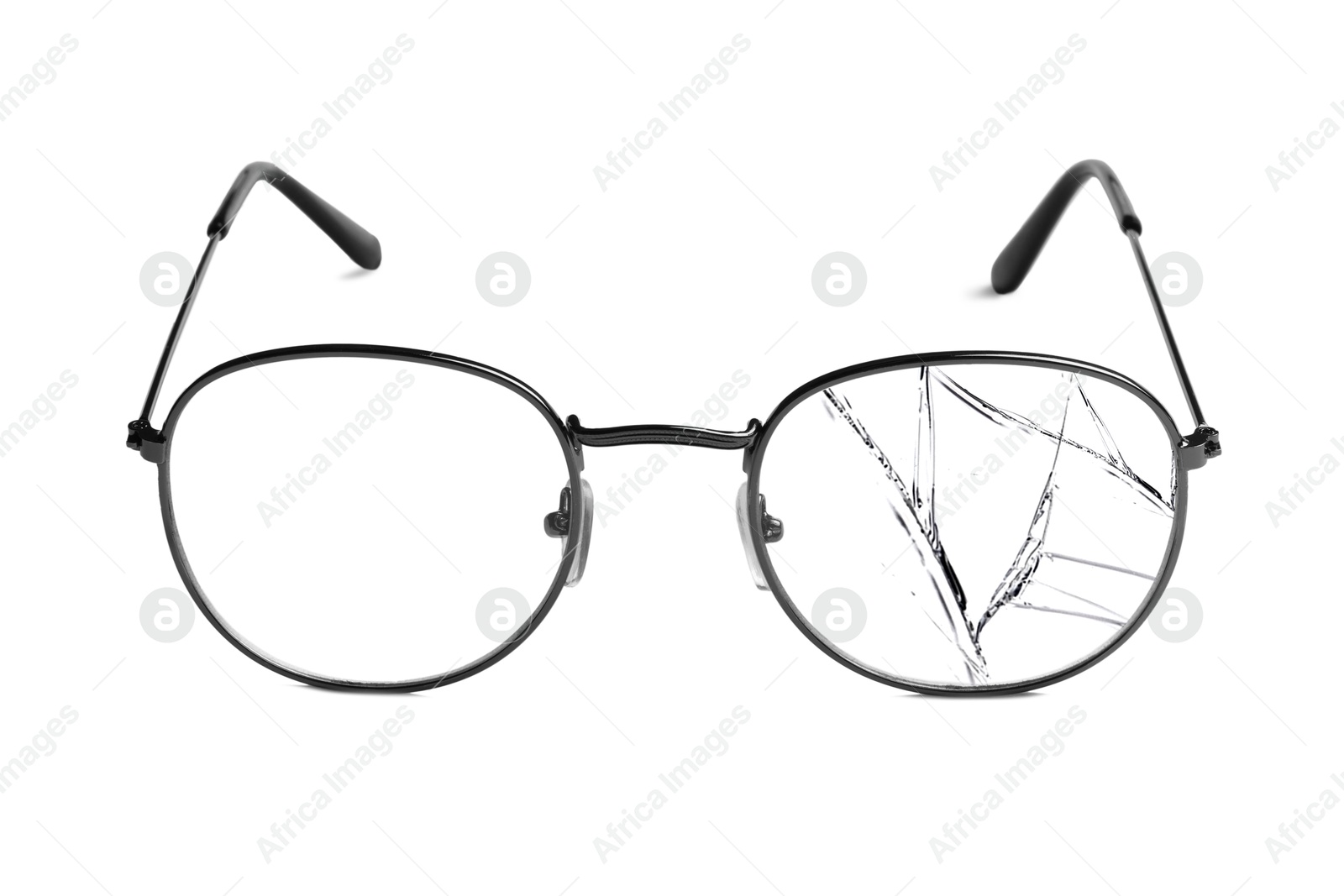 Image of Eyeglasses with one broken lens isolated on white