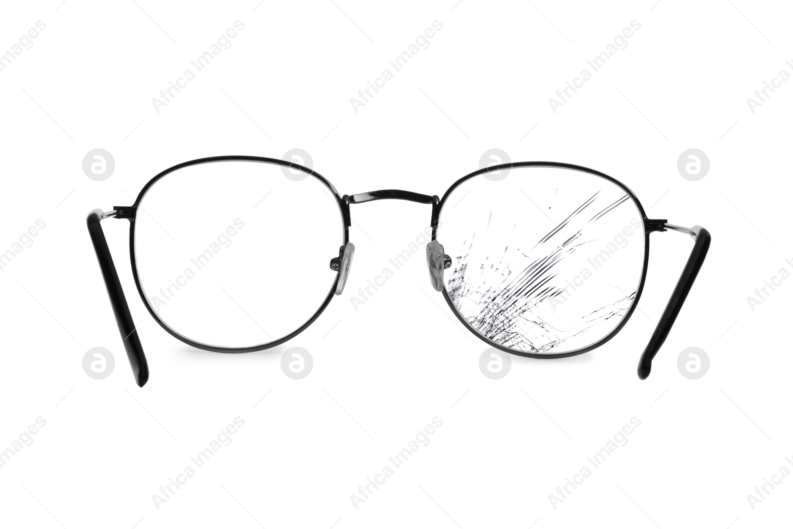 Image of Eyeglasses with one broken lens isolated on white