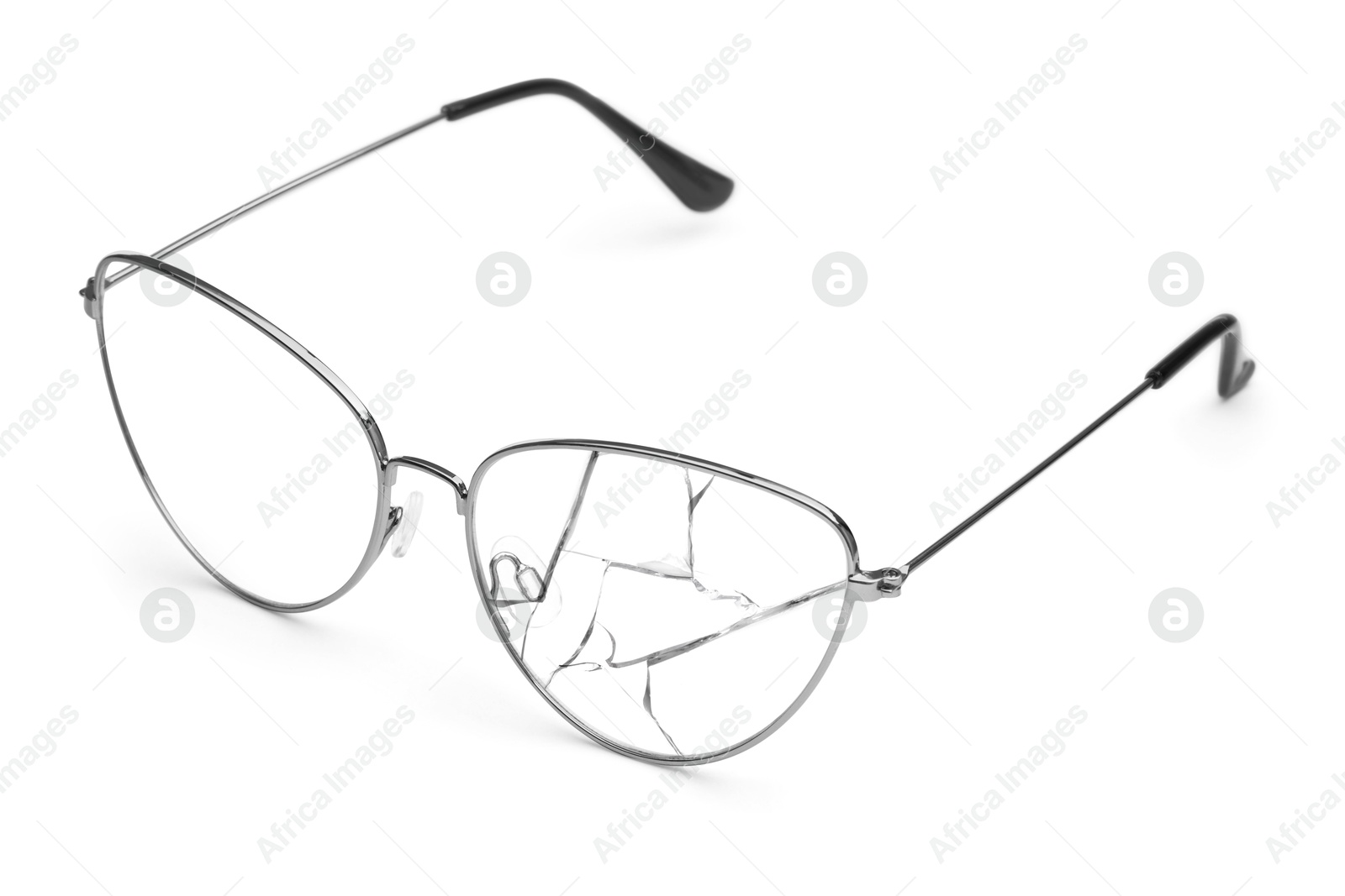 Image of Eyeglasses with one broken lens isolated on white