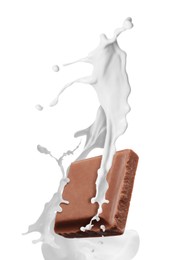 Image of Milkshake with piece of chocolate on white background