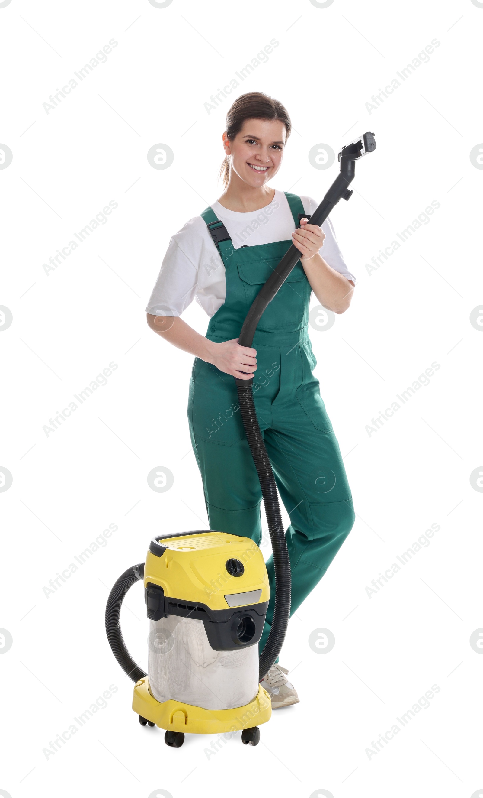 Photo of Smiling cleaning service worker with vacuum cleaner on white background