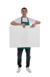 Photo of Smiling cleaning service worker with sheet of paper on white background. Space for text