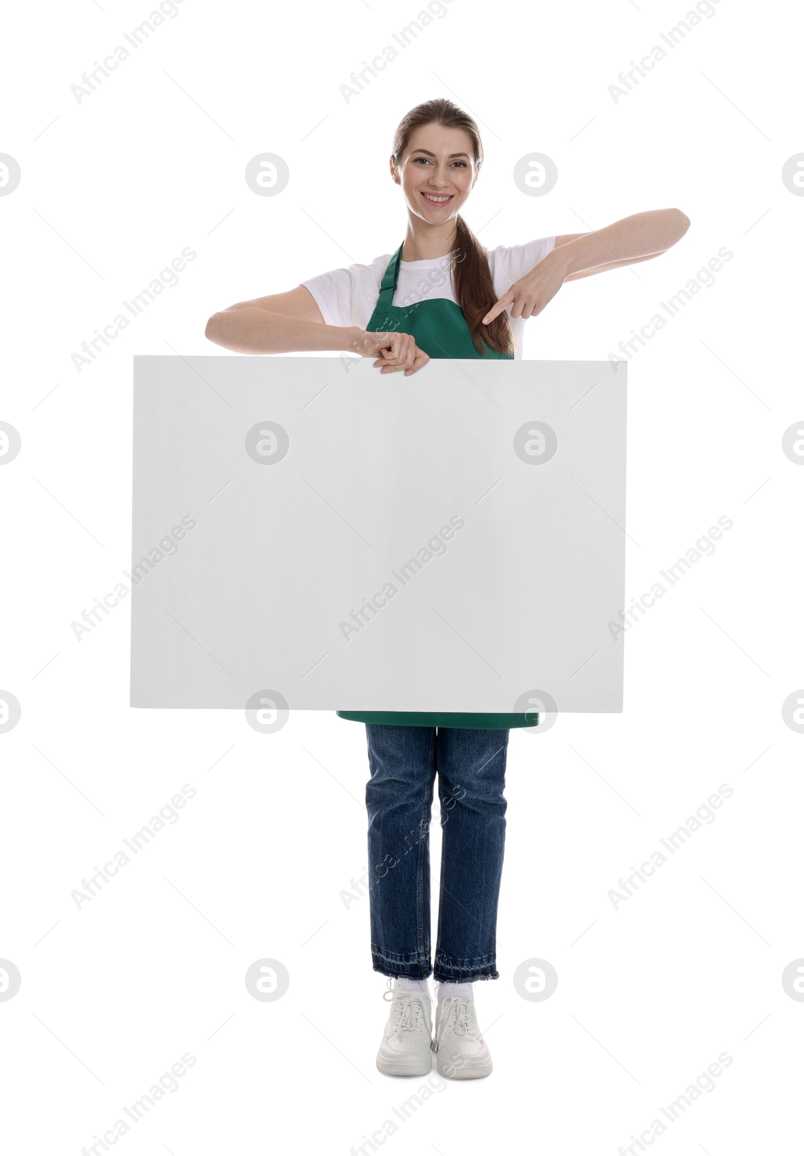 Photo of Smiling cleaning service worker with sheet of paper on white background. Space for text