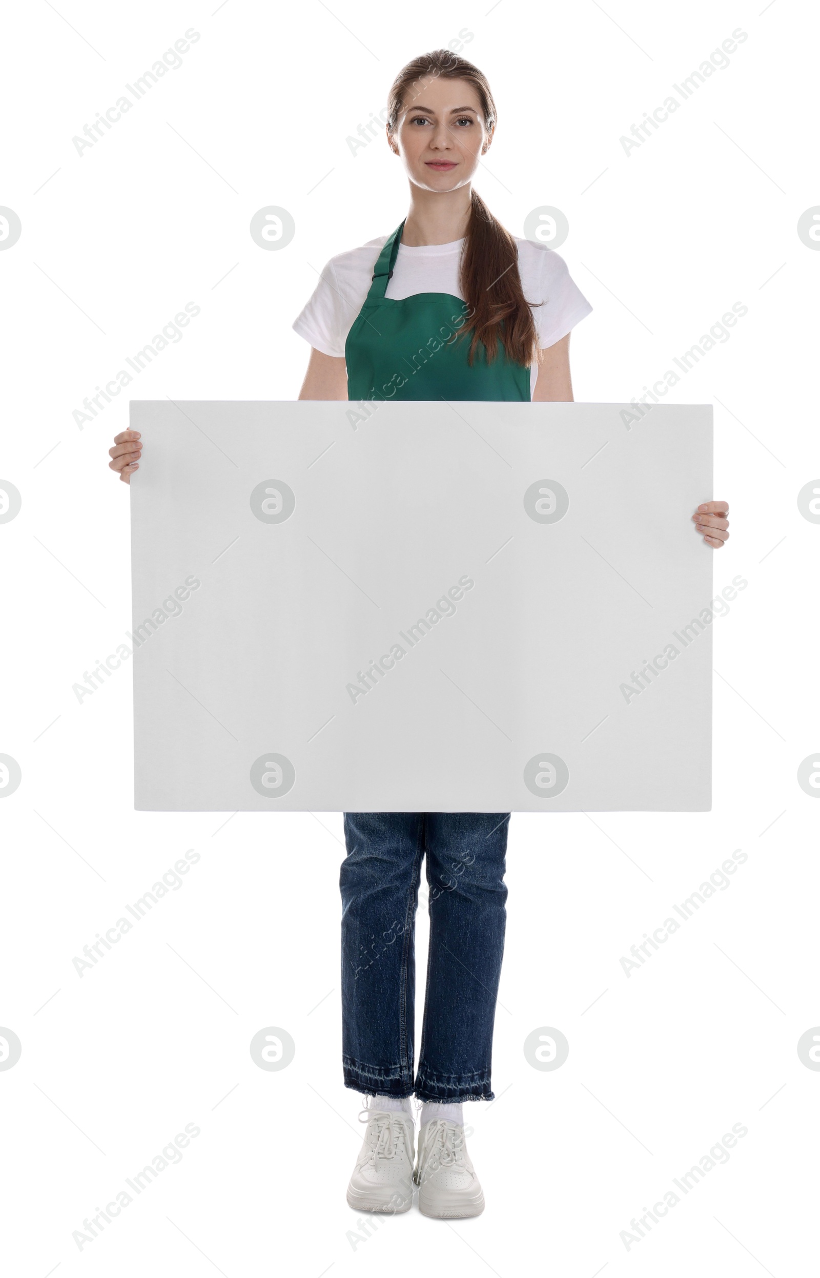 Photo of Cleaning service worker with sheet of paper on white background. Space for text