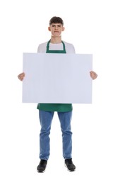 Photo of Cleaning service worker with sheet of paper on white background. Space for text