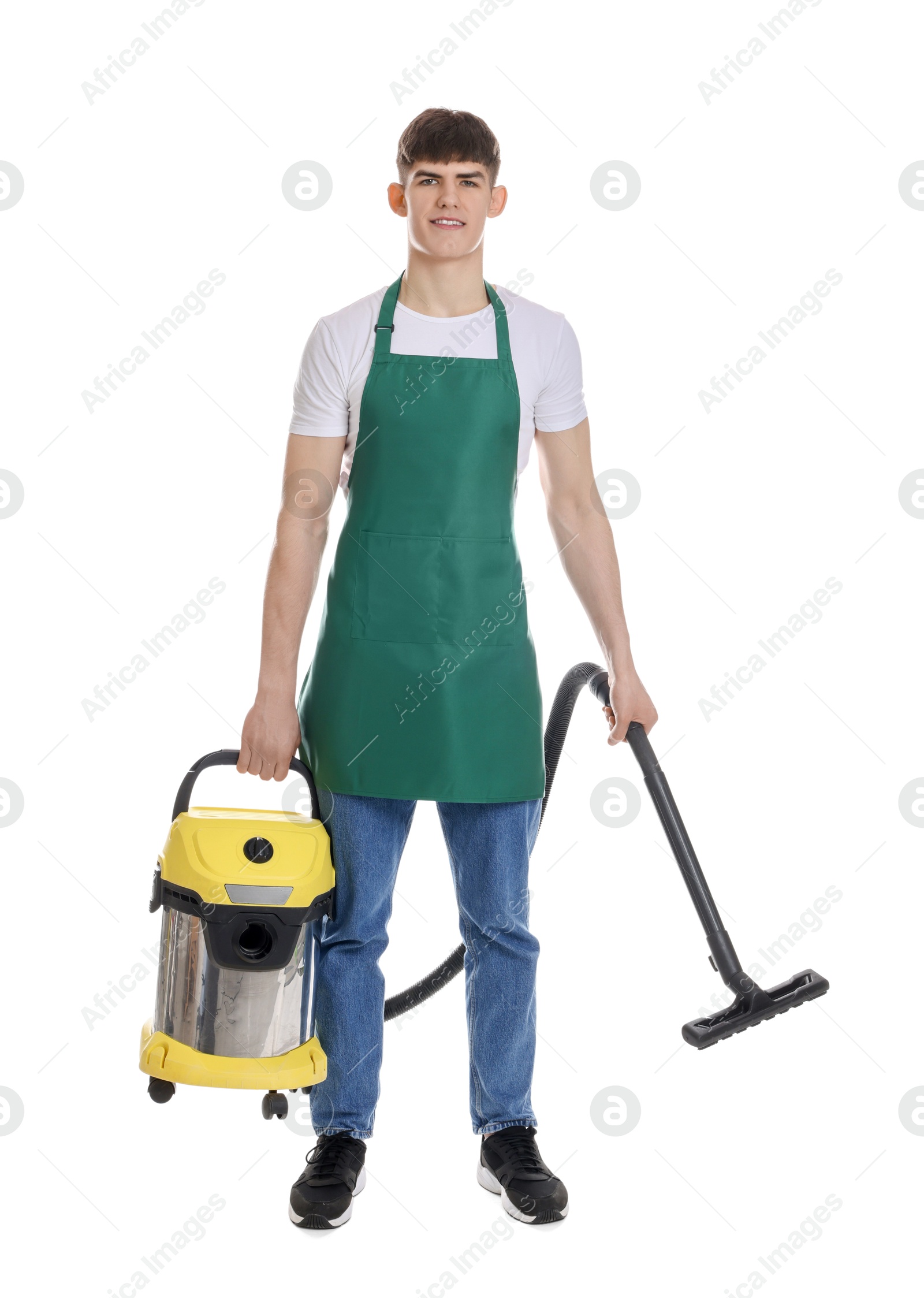 Photo of Smiling cleaning service worker with vacuum cleaner on white background