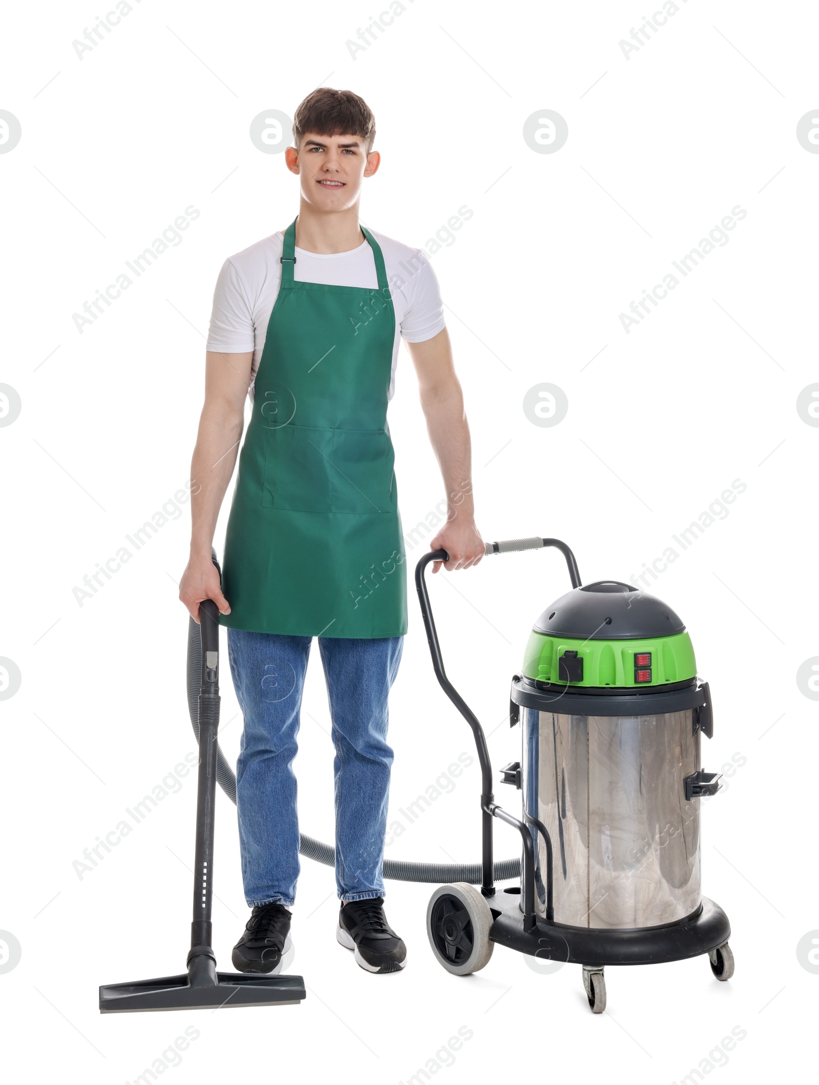 Photo of Smiling cleaning service worker with vacuum cleaner on white background