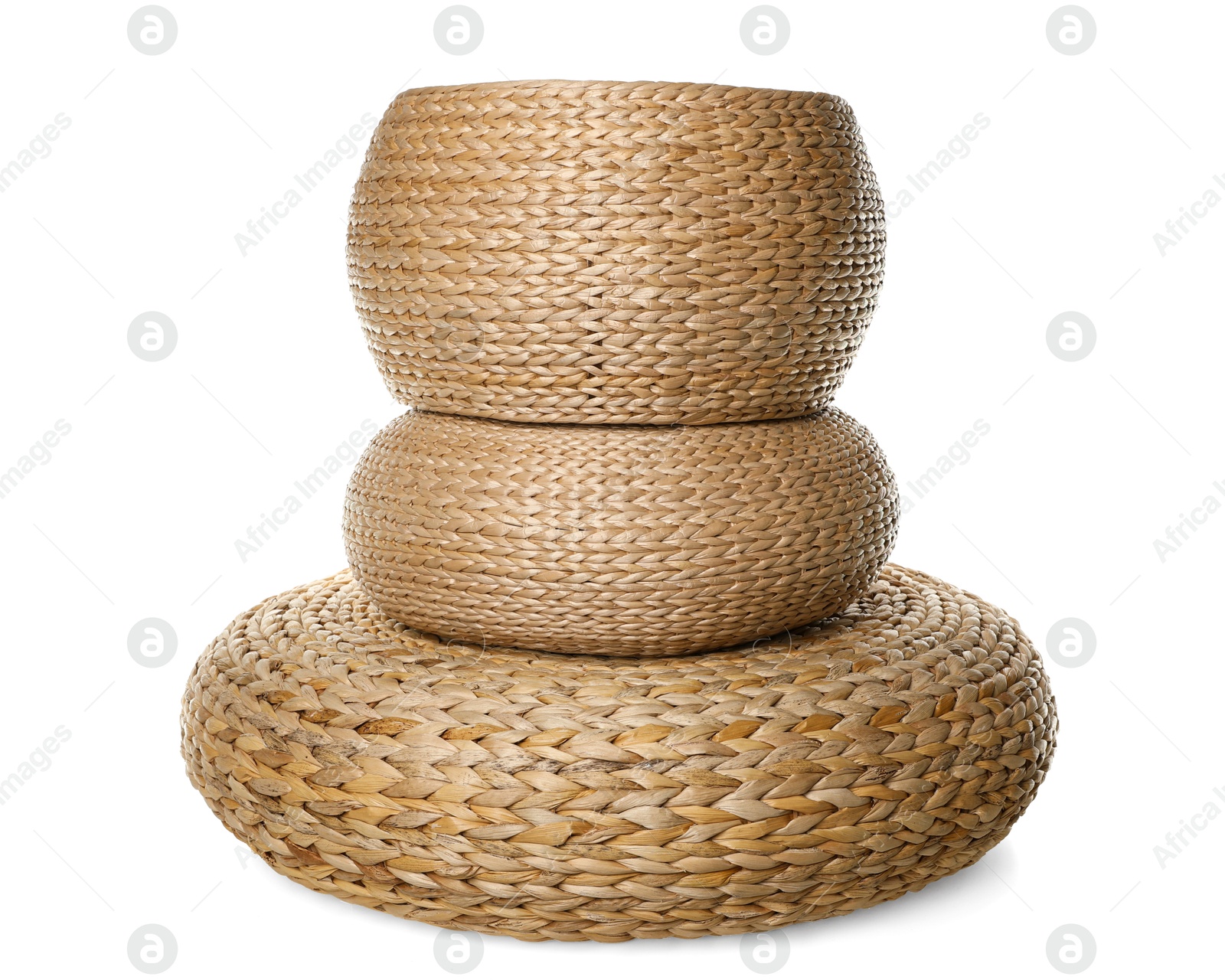 Photo of Three stylish wicker poufs on white background