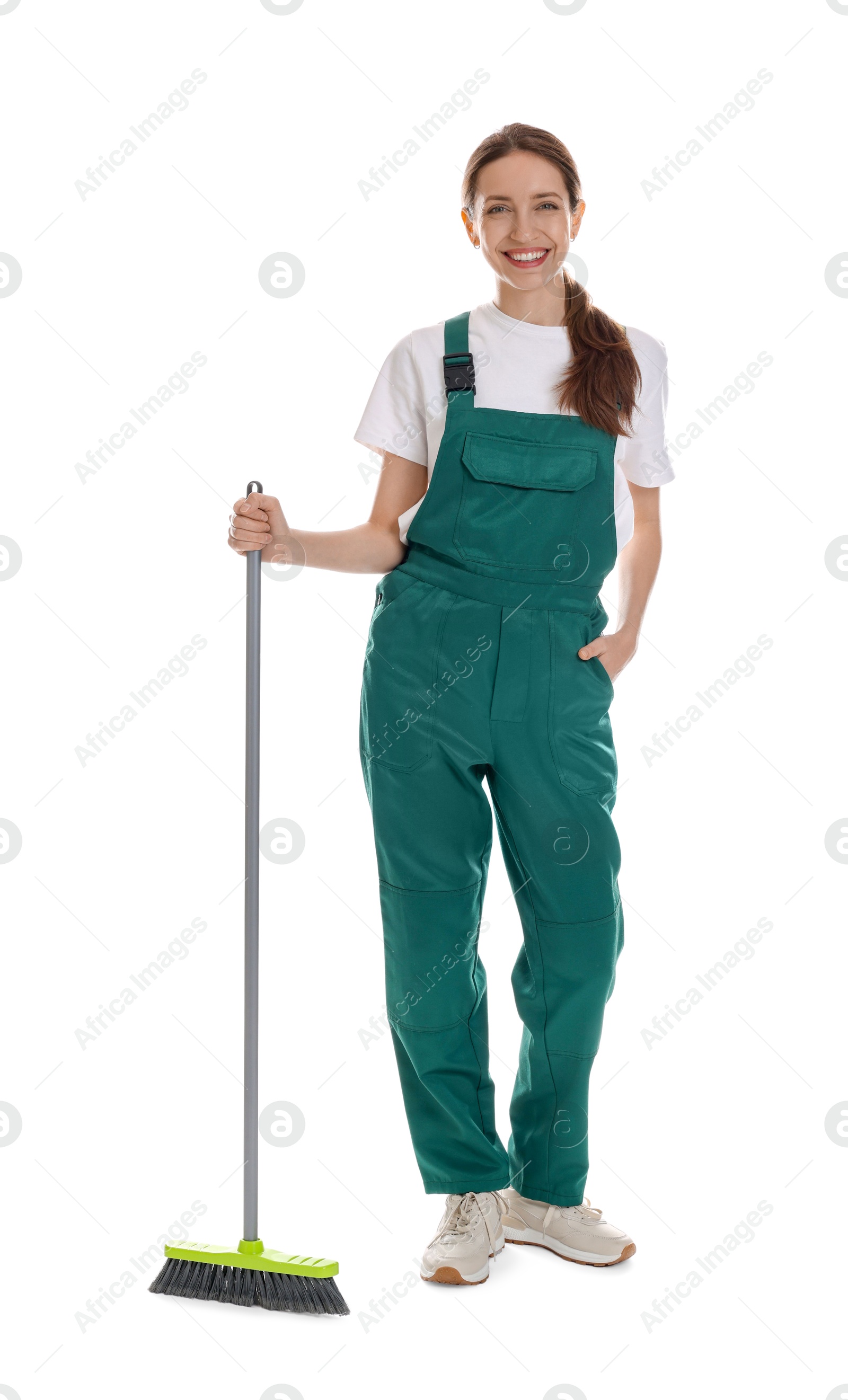 Photo of Smiling cleaning service worker with broom on white background