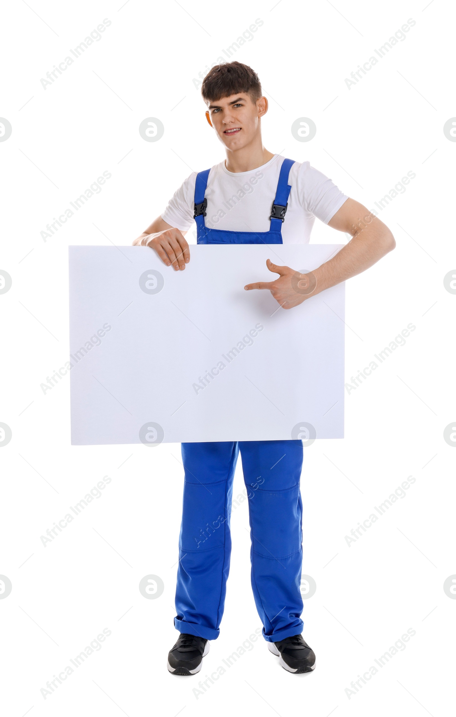 Photo of Smiling cleaning service worker with sheet of paper on white background. Space for text