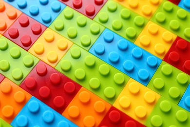 Photo of Constructor toy. Many colorful building blocks as background, above view