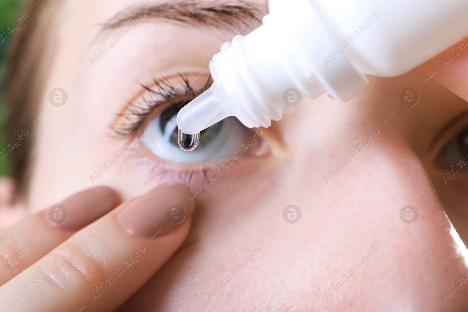 Photo of Allergy treatment. Woman dripping medical drops into eyes, closeup