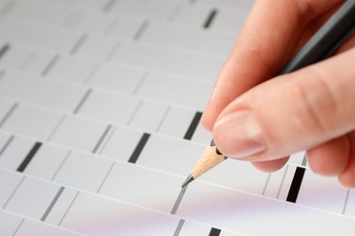 Photo of Scientist analyzing DNA data in laboratory, closeup