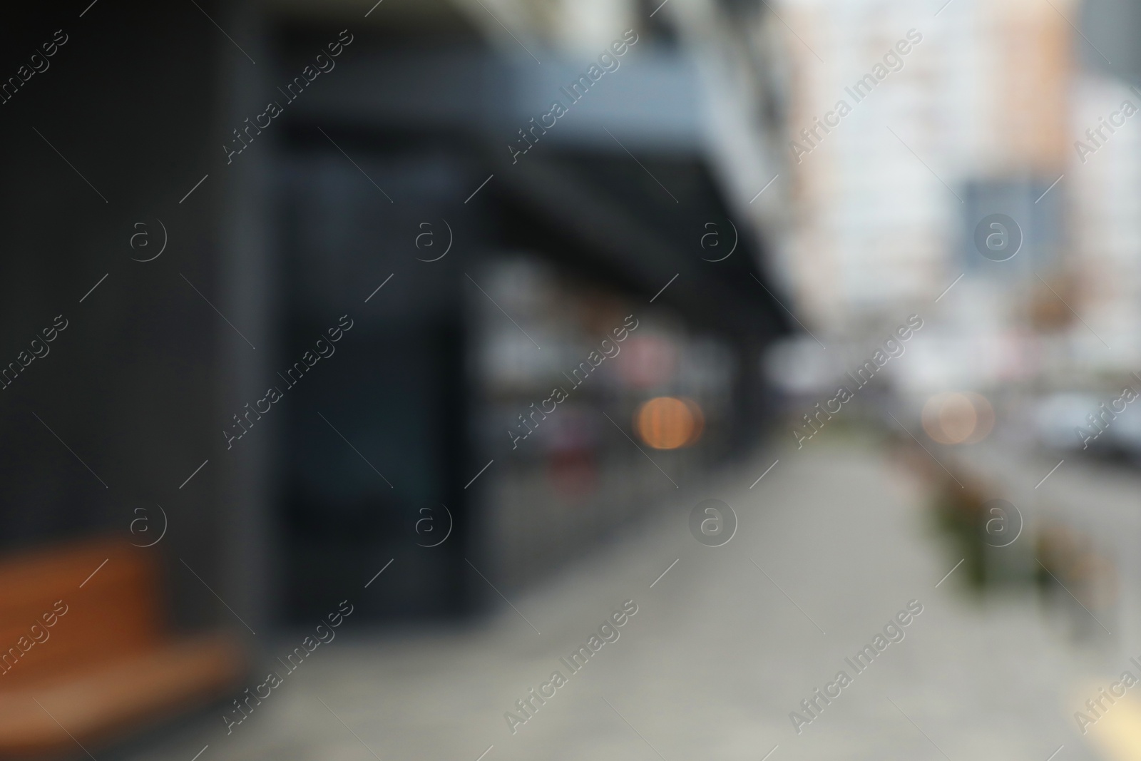 Photo of Blurred view of modern building with many windows outdoors