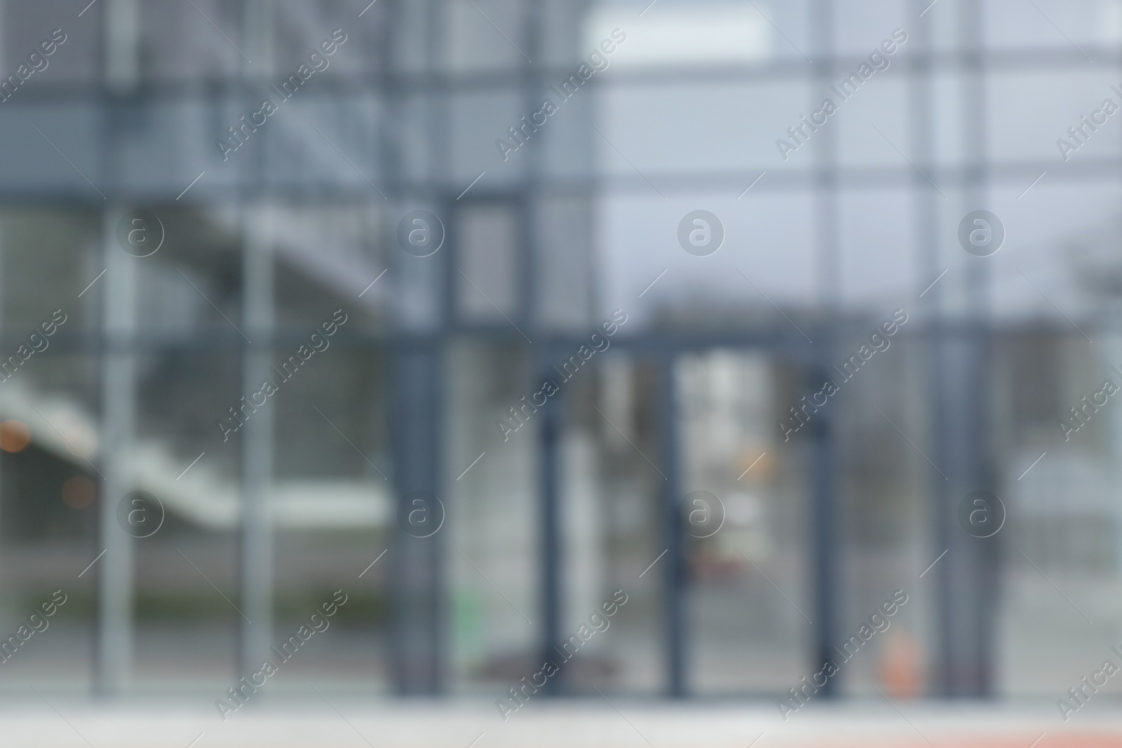 Photo of Blurred view of modern building with many windows outdoors