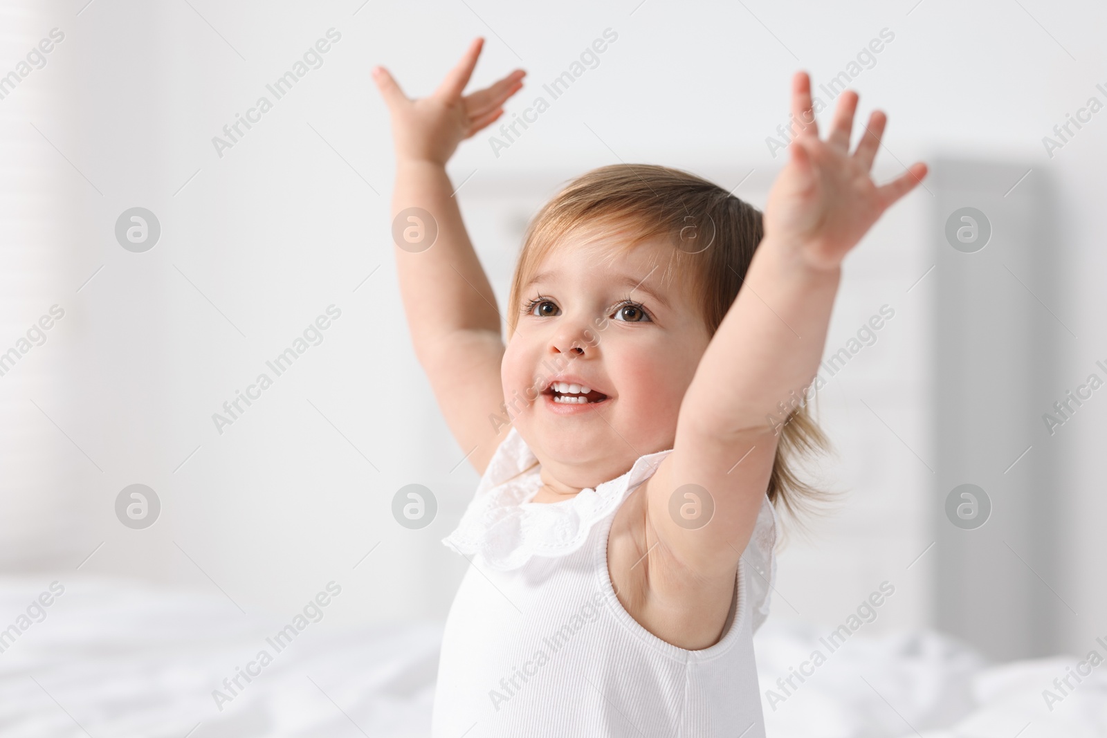 Photo of Portrait of cute little baby girl at home