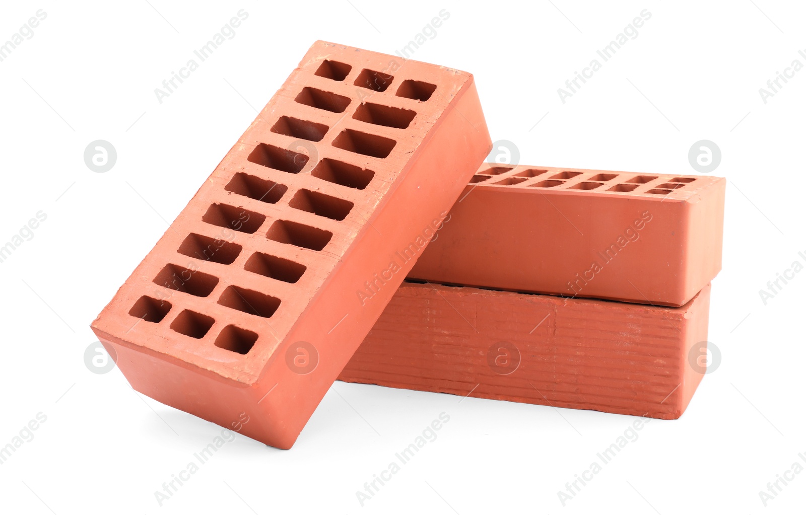 Photo of Red bricks isolated on white. Construction material