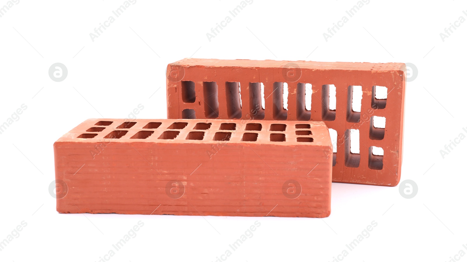 Photo of Red bricks isolated on white. Construction material