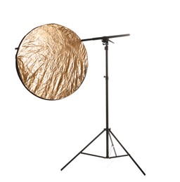 Photo of Stand with light reflector isolated on white. Photo studio equipment