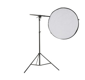 Photo of Stand with light reflector isolated on white. Photo studio equipment