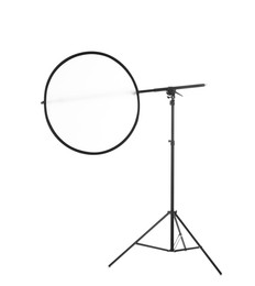 Photo of Stand with light reflector isolated on white. Photo studio equipment