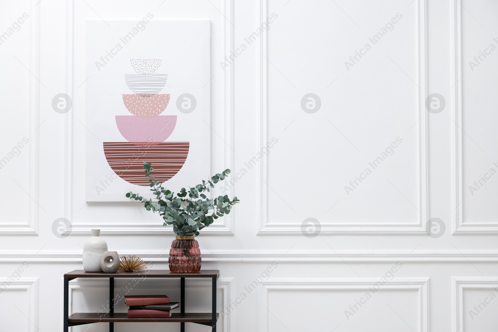 Photo of Console table with decor near white wall in room, space for text. Interior design