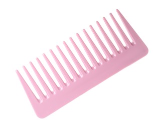 Photo of One pink plastic comb isolated on white