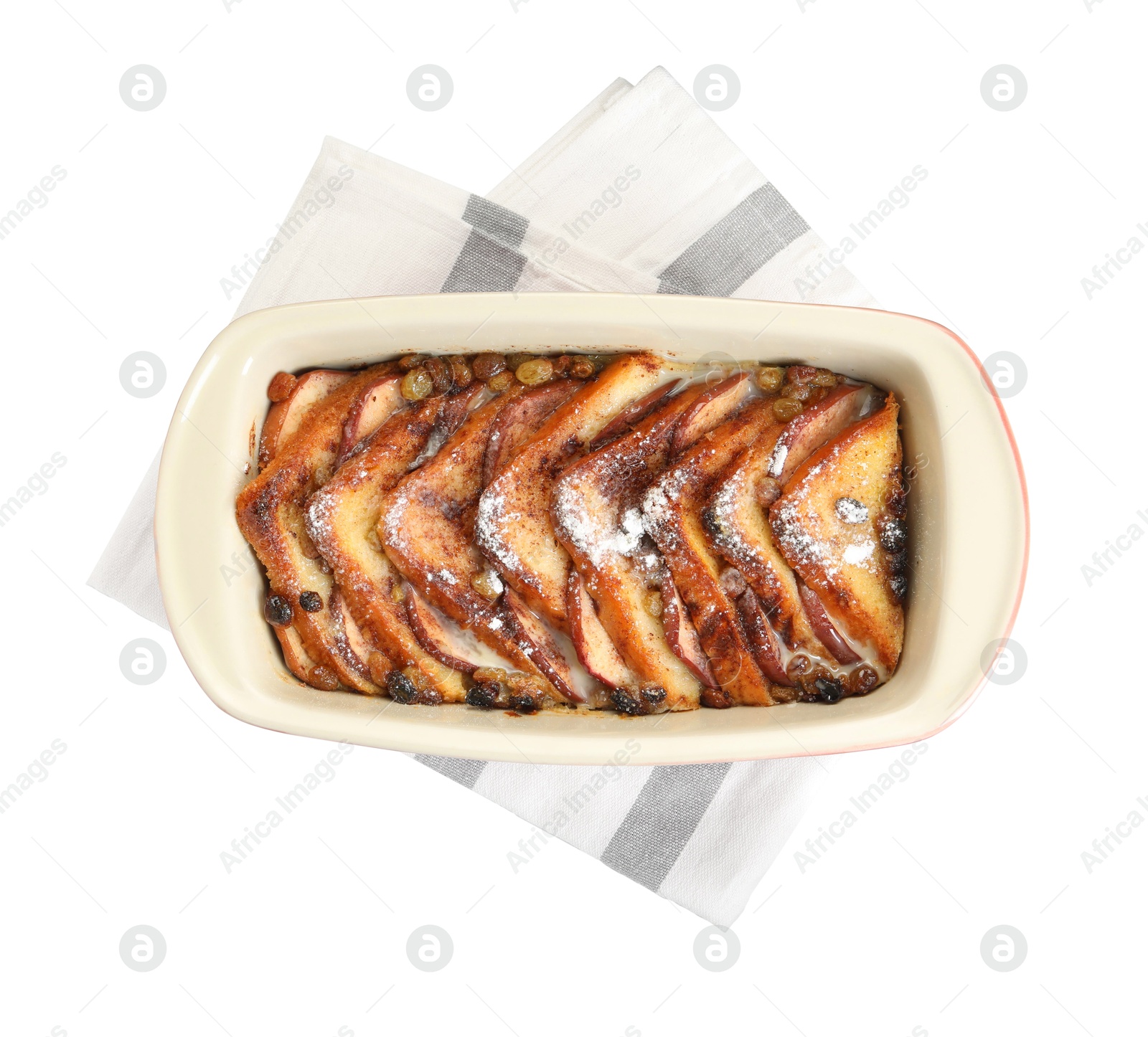 Photo of Freshly baked bread pudding in baking dish isolated on white, top view