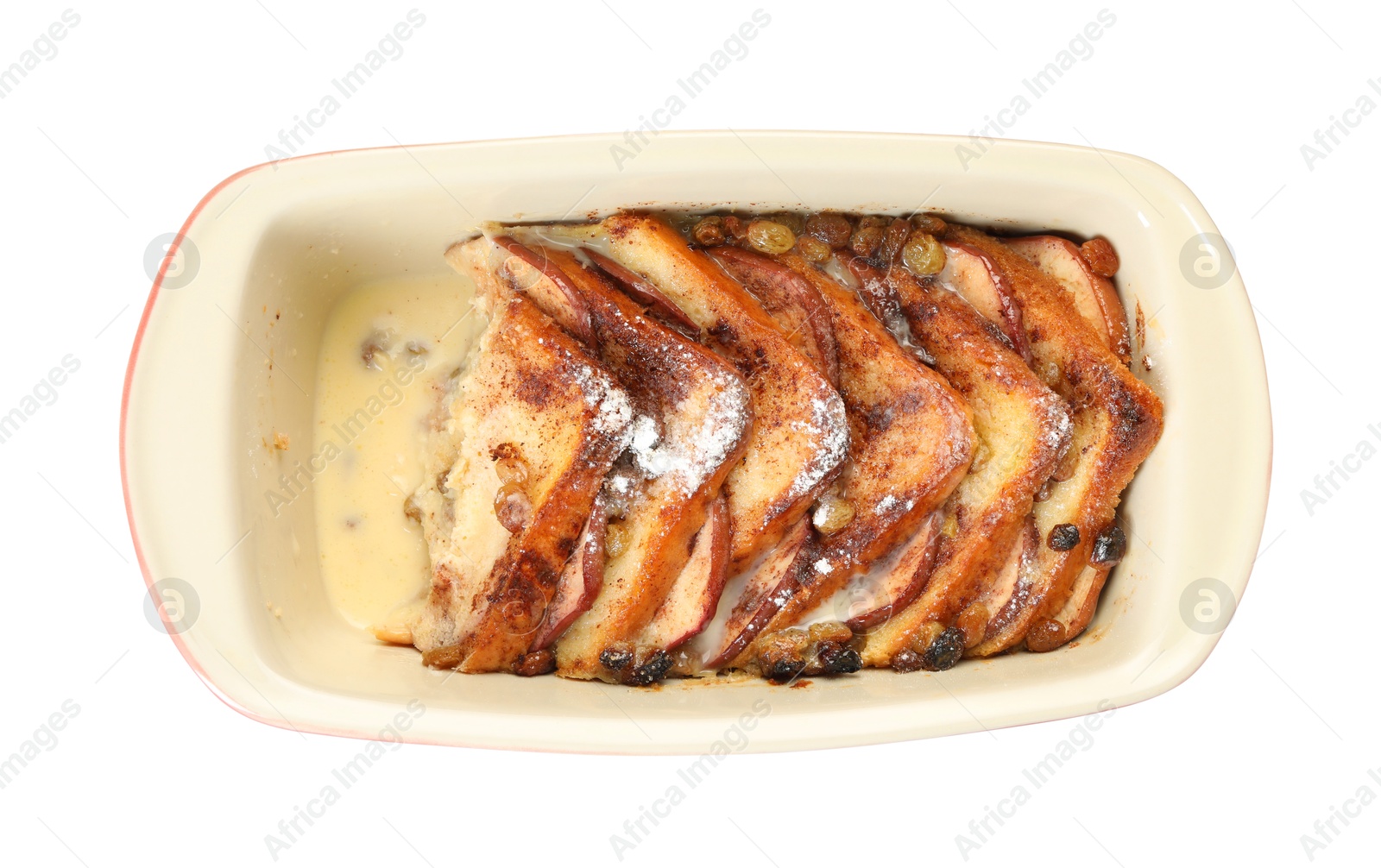 Photo of Freshly baked bread pudding in baking dish isolated on white, top view