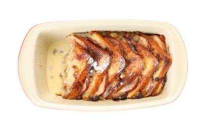 Photo of Freshly baked bread pudding in baking dish isolated on white, top view