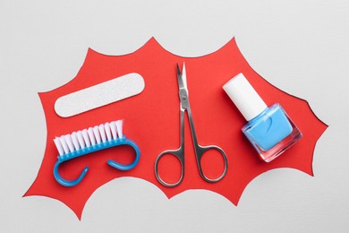 Photo of Set of pedicure tools on color background, flat lay