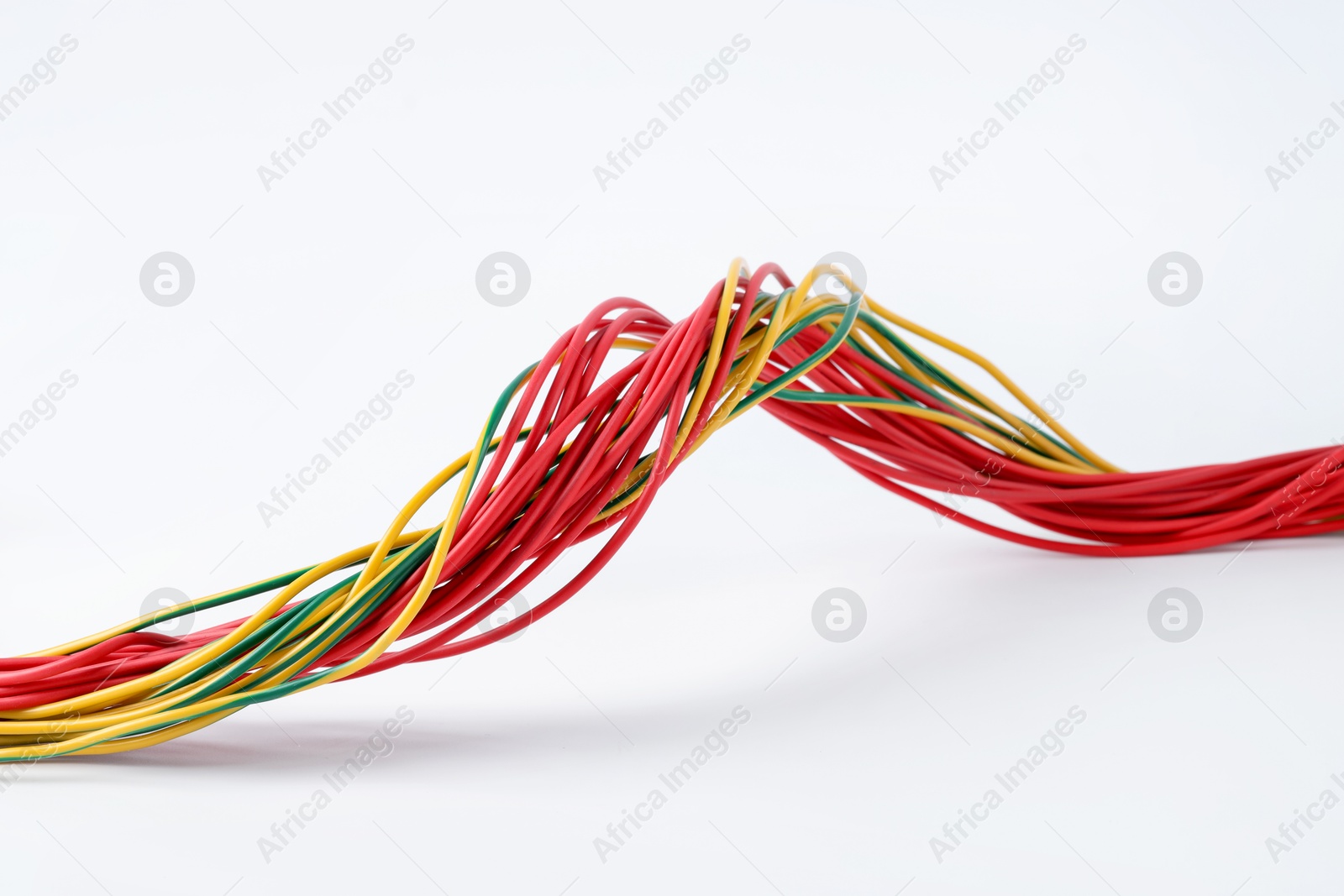 Photo of Many colorful electrical wires isolated on white