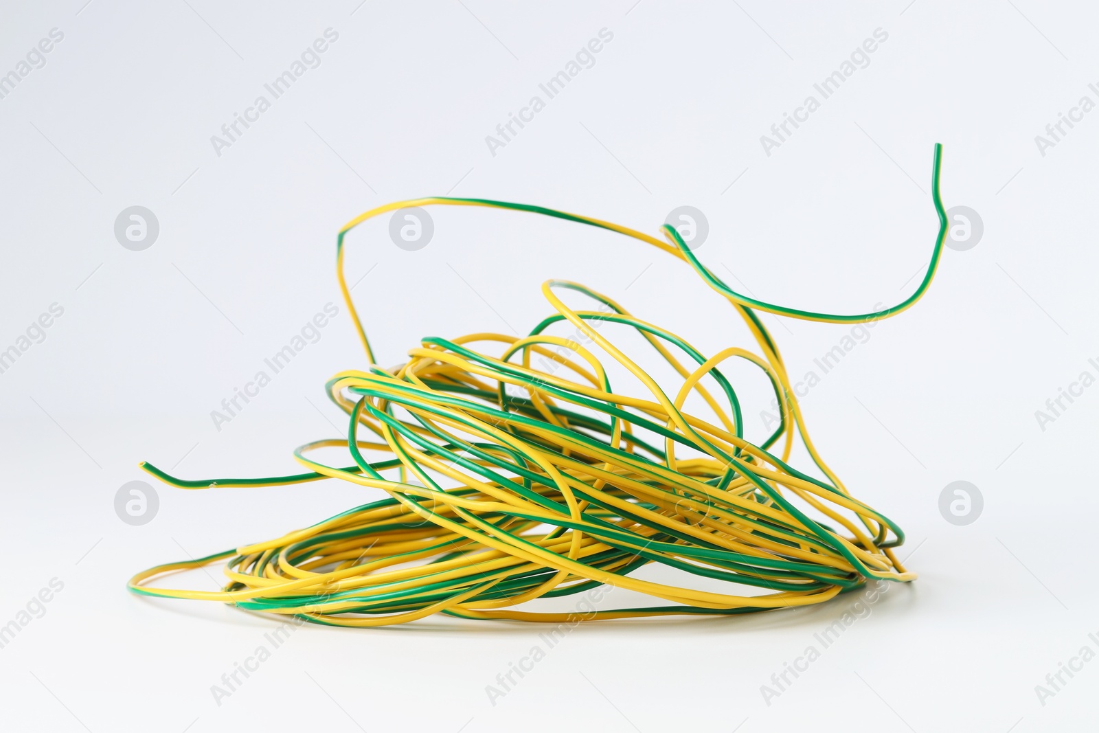 Photo of Insulated colorful electrical wire isolated on white