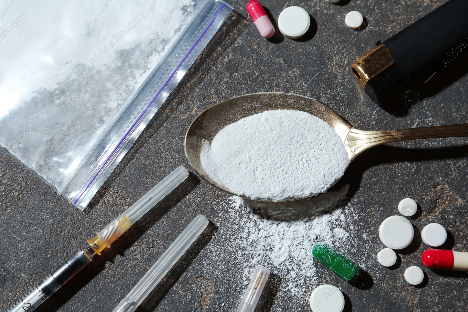 Photo of Flat lay composition with different drugs on gray textured table