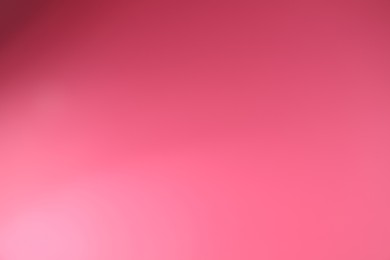 Photo of Bright pink gradient background. Abstract color backdrop for design