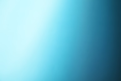 Photo of Light blue gradient background. Abstract color backdrop for design