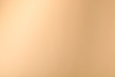 Photo of Beige gradient background. Abstract color backdrop for design