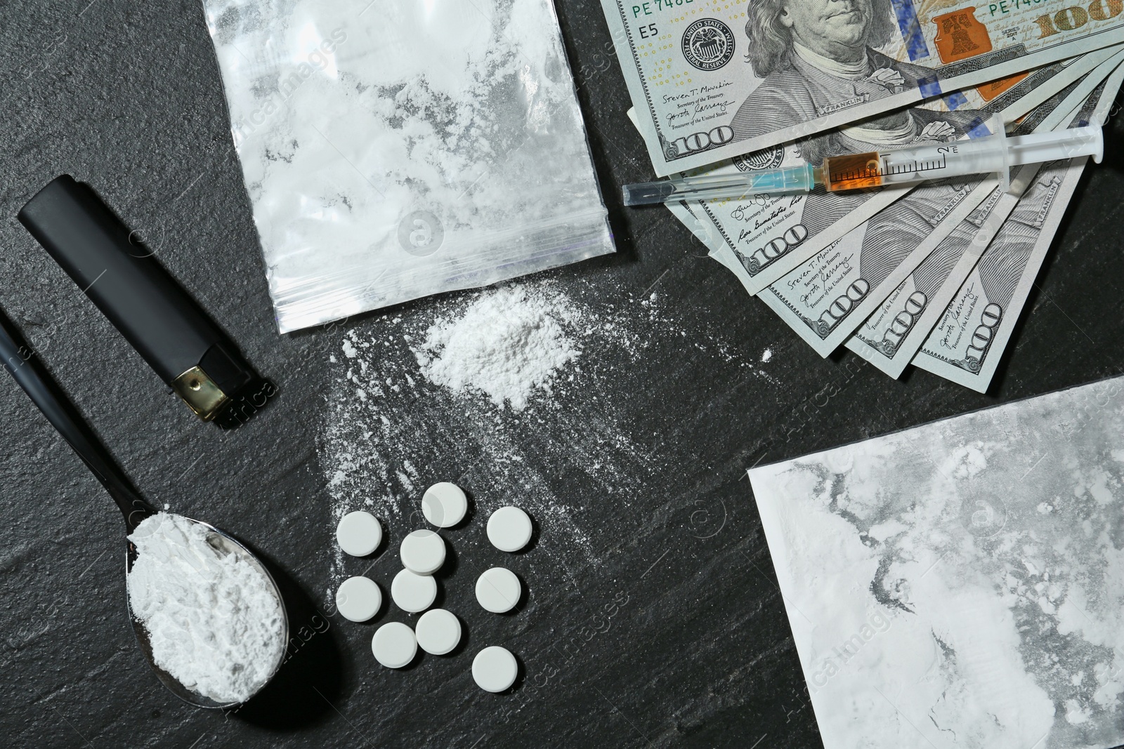 Photo of Flat lay composition with different drugs on black textured table