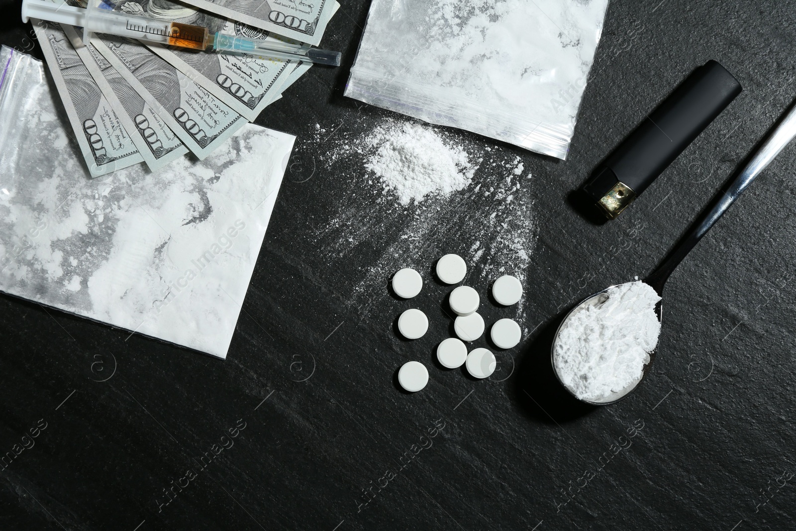 Photo of Flat lay composition with different drugs on black textured table