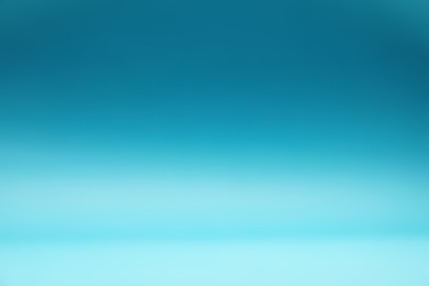 Photo of Light blue gradient background. Abstract color backdrop for design