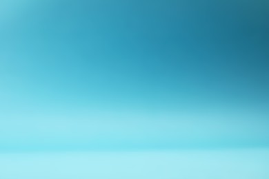 Photo of Light blue gradient background. Abstract color backdrop for design