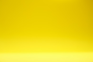 Photo of Yellow gradient background. Abstract color backdrop for design