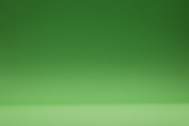 Photo of Green gradient background. Abstract color backdrop for design