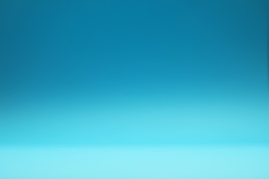 Photo of Light blue gradient background. Abstract color backdrop for design