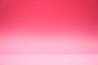 Photo of Bright pink gradient background. Abstract color backdrop for design